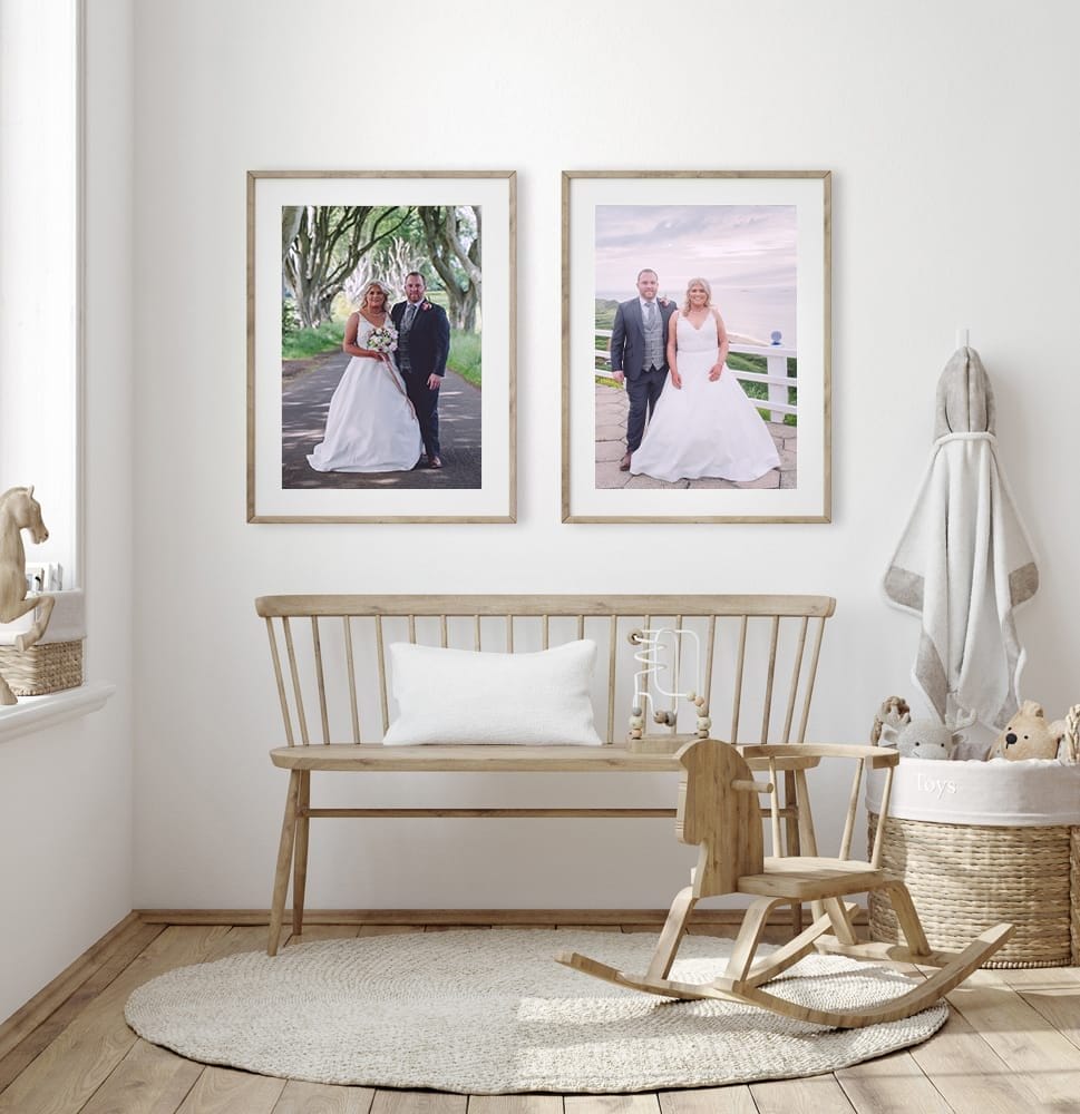 A cozy room with a wooden bench, rockers, toys, a round rug, and two framed wedding photos by a talented Ballymoney wedding photographer on the wall above the bench. northern ireland wedding photographer